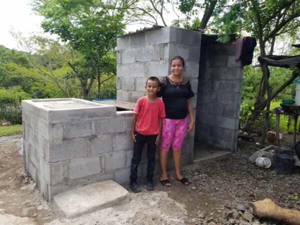 Anderson and his mother in Honduras